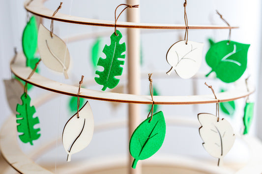 Christmas ornament. Set of green and white leafs